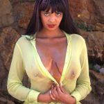 big breasts showingthrough yellow top